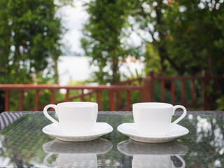 Obraz na płótnie Canvas coffees on table in garden terrace