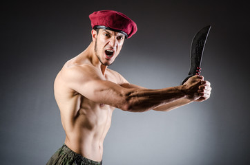 Funny soldier in military concept