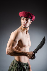 Funny soldier in military concept