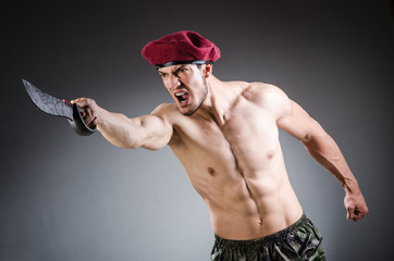 Funny soldier in military concept