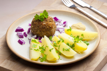 rissole with cooked potatoes
