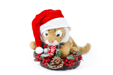 Cute toy tiger with Christmas wreath