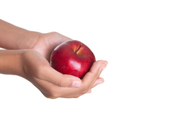 Girl hands holding a red apple over white background