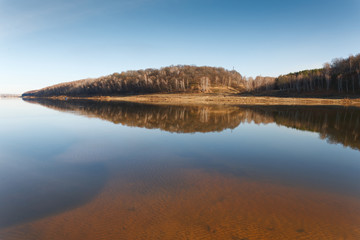 beach of the river in cold autumn day