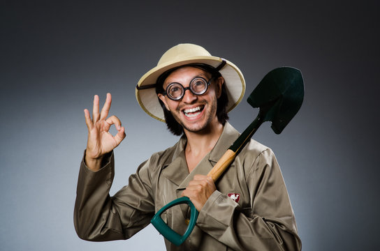 Funny safari hunter against background