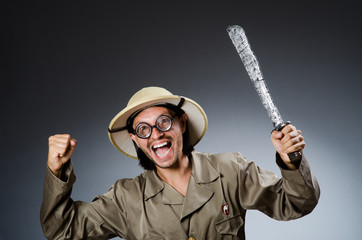 Funny safari hunter against background