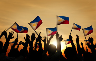 Group of People Waving Filipino Flags
