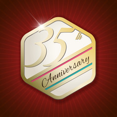 35th Anniversary - golden Seal, Badge on red rays background