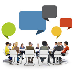 Group of People in Meeting with Speech Bubbles