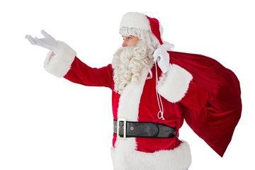 Santa with hand out and holding sack