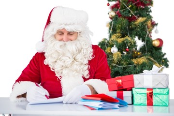 Happy santa writing letter for gifts