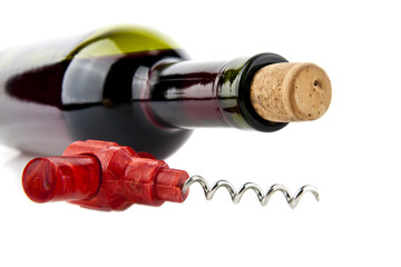 bottle of wine with corkscrew