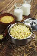 Millet porridge  in a metal pan