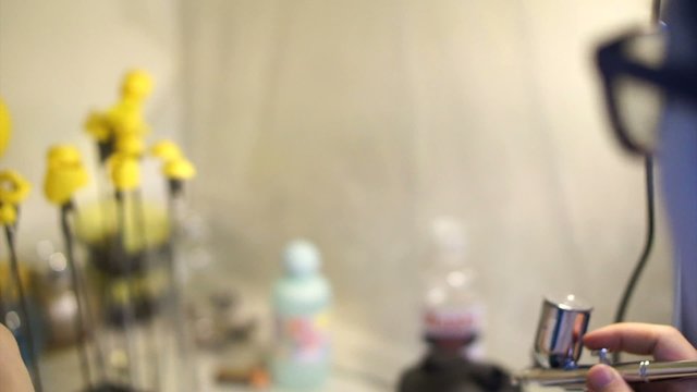 Plastic model colouring process