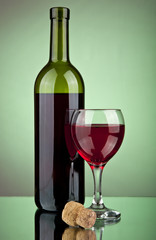 bottle and a glass of wine