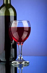 bottle and a glass of wine