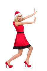 Sexy Santa Girl pushing the wall