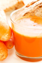 Carrot set with juice, carrots and carrot bread