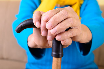 wrinkled hands of old woman