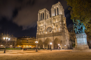 Fototapeta na wymiar Night view on illuminated Notre Dame cathedral in Paris