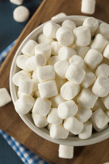 Fototapeta na wymiar White Mini Marshmallows in a Bowl