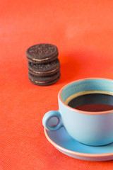 Coffee cup and chocolate cookies