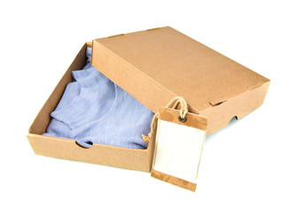 Clothes in open container with card - 73002913