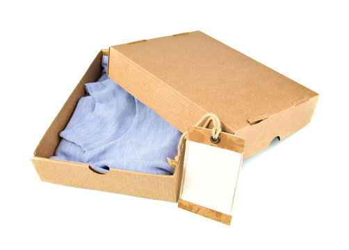 Clothes in open container with card