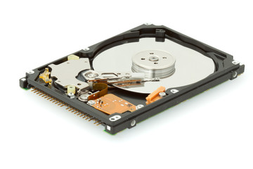 Broken hard drive disk on white background