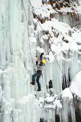 Ice climbing the waterfall.