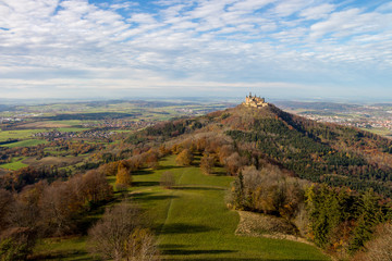Scenic view on fairy tale castle Burg Hohenzollern in autumn