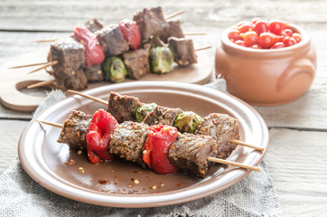 Grilled beef skewers with pepper and brussels