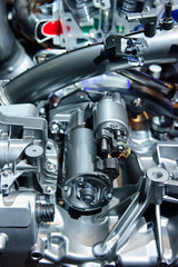 Engine with metal and chrome parts of car motor