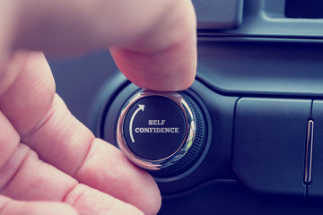 Man turning up a dial reading - Self Confidence