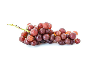 Bunch of red grapes , fresh with water drops. Isolated on white background.