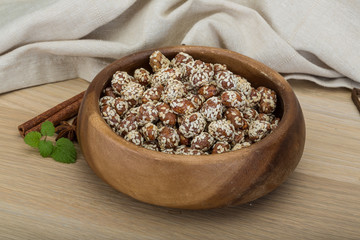 Peanut in honey with sesame seeds