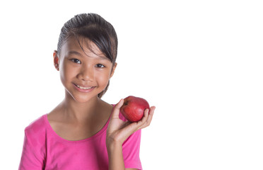 Young Asian Malay teenager with a red apple