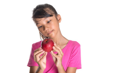 Young Asian Malay teenager with a red apple