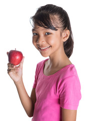 Young Asian Malay teenager with a red apple