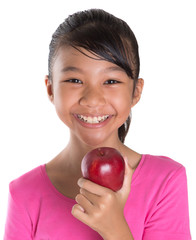 Young Asian Malay teenager with a red apple