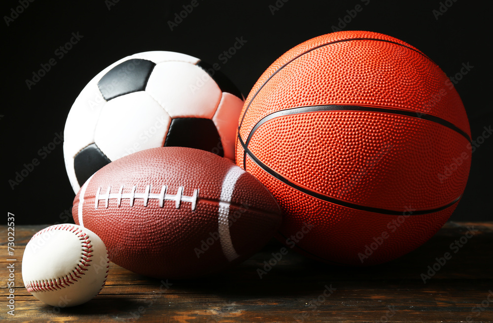 Canvas Prints Sports balls on black background