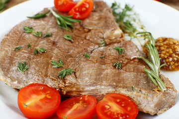 Delicious grilled meat on table