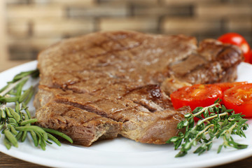 Delicious grilled meat on table, close-up