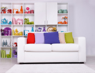 Modern interior design. White living room with sofa and