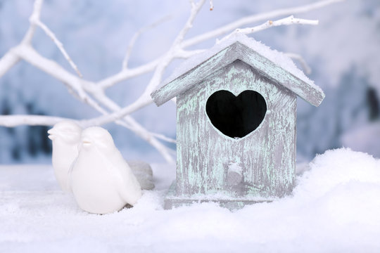 Beautiful Christmas composition with small bird house
