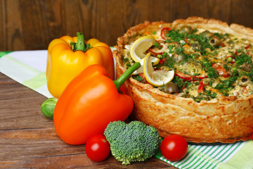 Vegetable pie with broccoli, peas, paprika, tomatoes and cheese