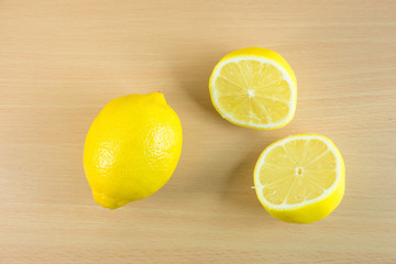 sliced lemons on a cutting board
