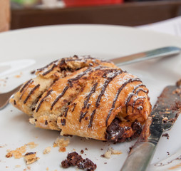 Chocolate croissant on plate