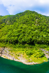 Fototapeta na wymiar Mountain lake. green water lake in forest