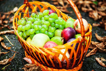 Large wicker basket with fruits and vegetables